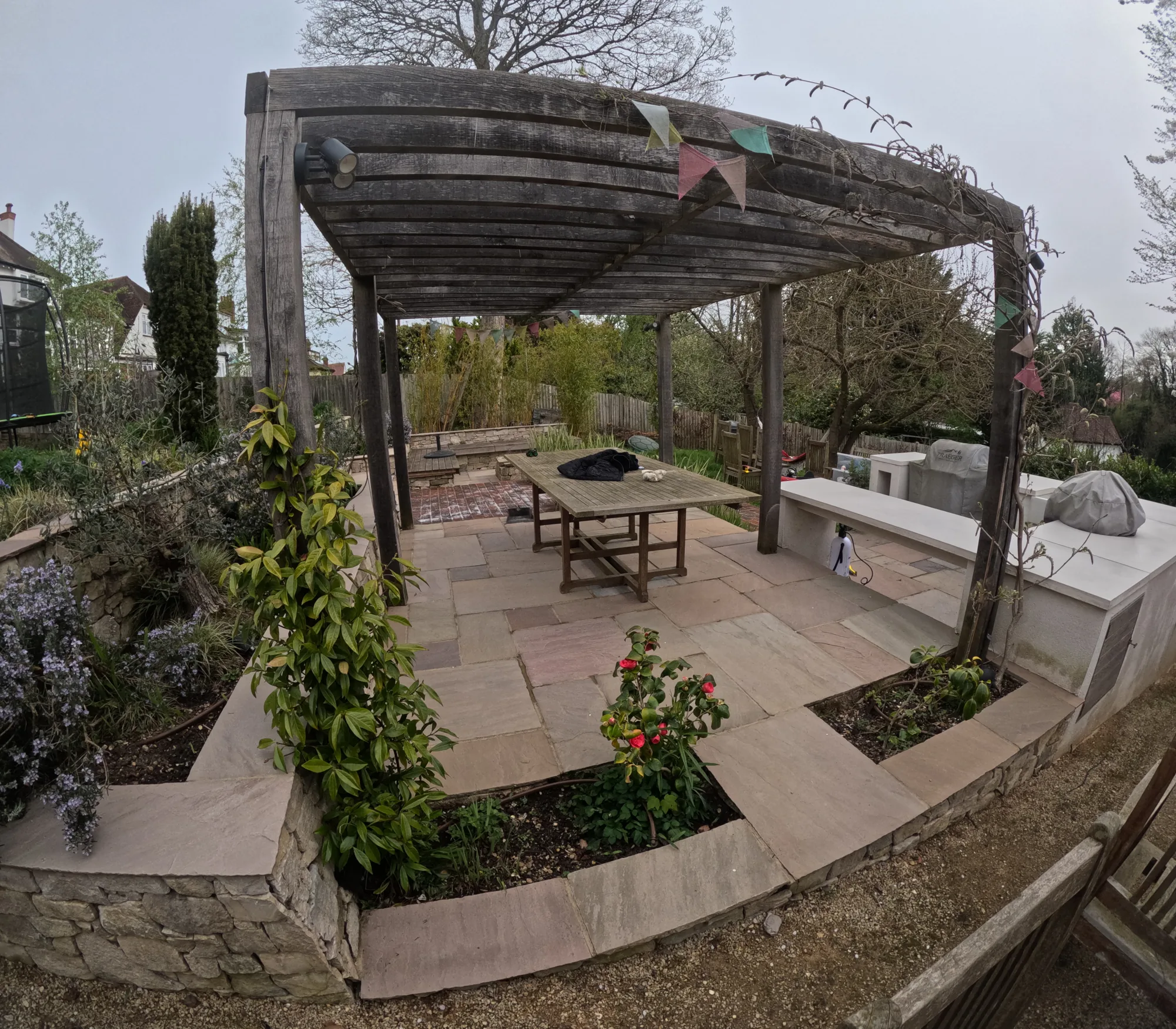 Garden patio cleaned under a pergola in Hertfordshire