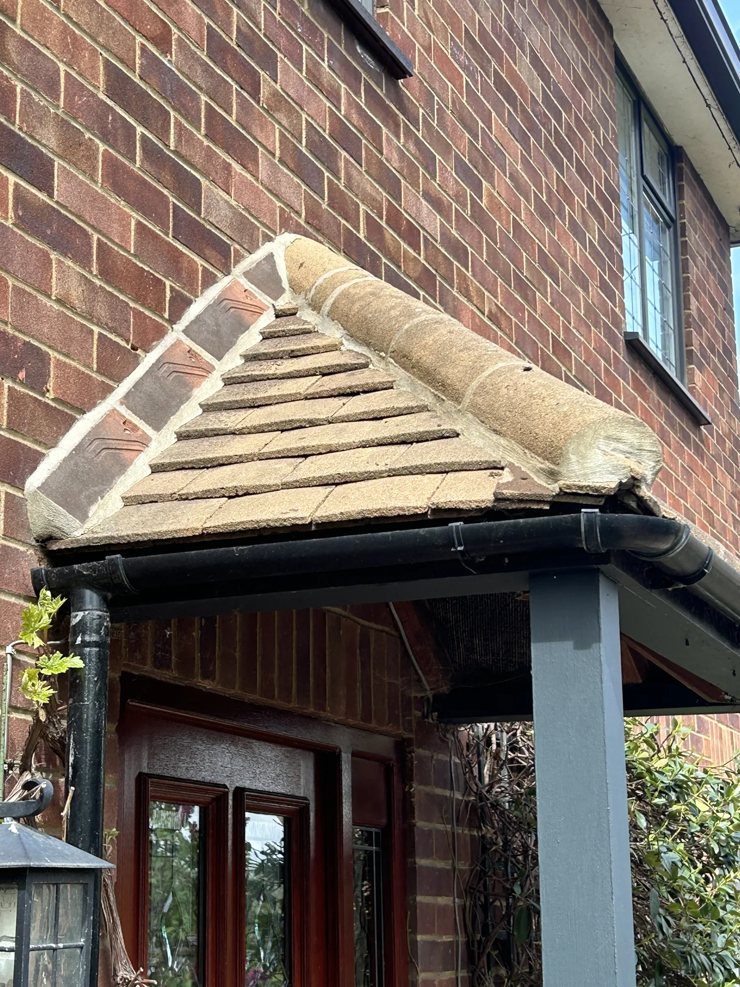 Porch canopy roof cleaned during exterior cleaning